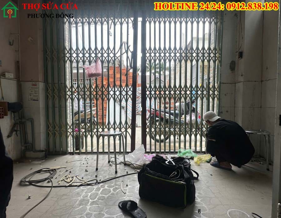 thợ sửa cửa kéo sắt